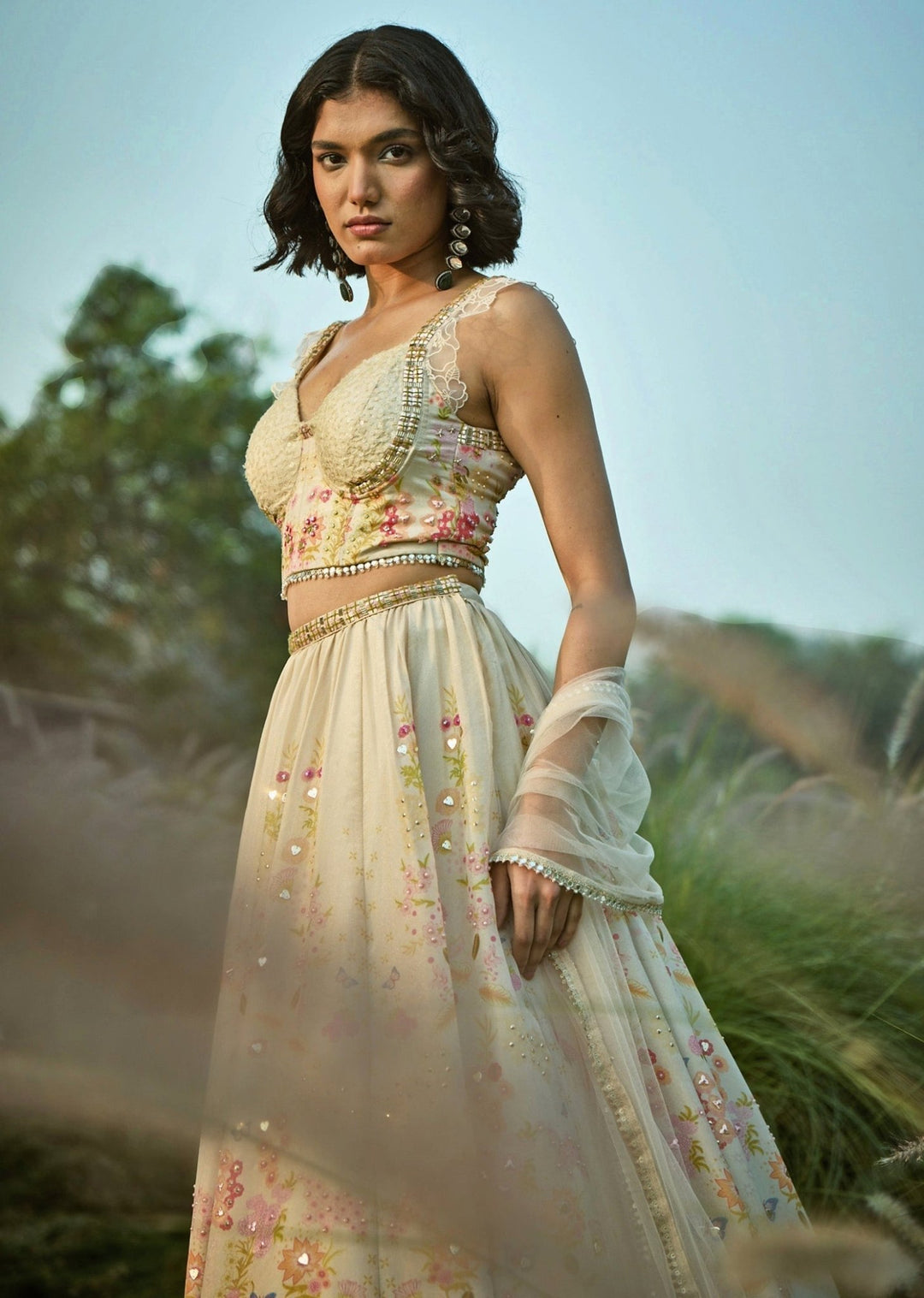 Basil Leaf Off White Floral Tissue Lehenga Set With CorsetFabilicious Fashion
