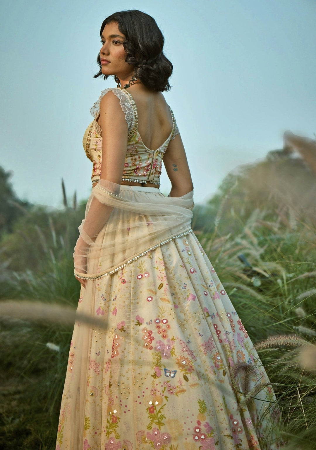 Basil Leaf Off White Floral Tissue Lehenga Set With CorsetFabilicious Fashion