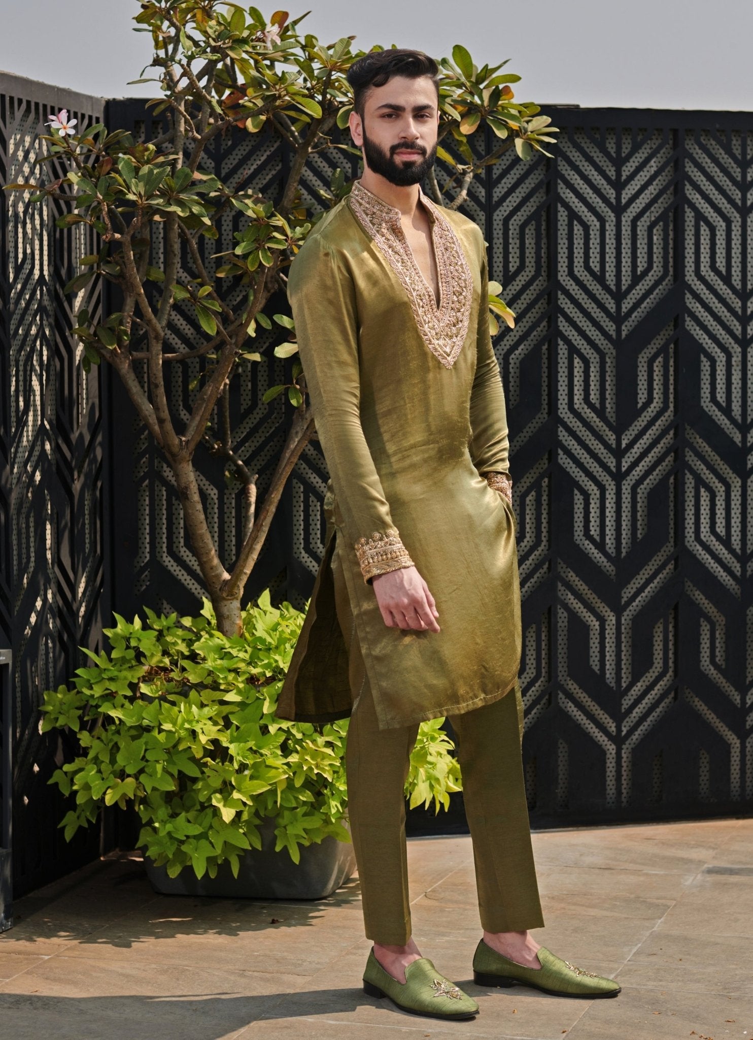 Olive green embroidered silk kurta pant set by Jigar and Nikita