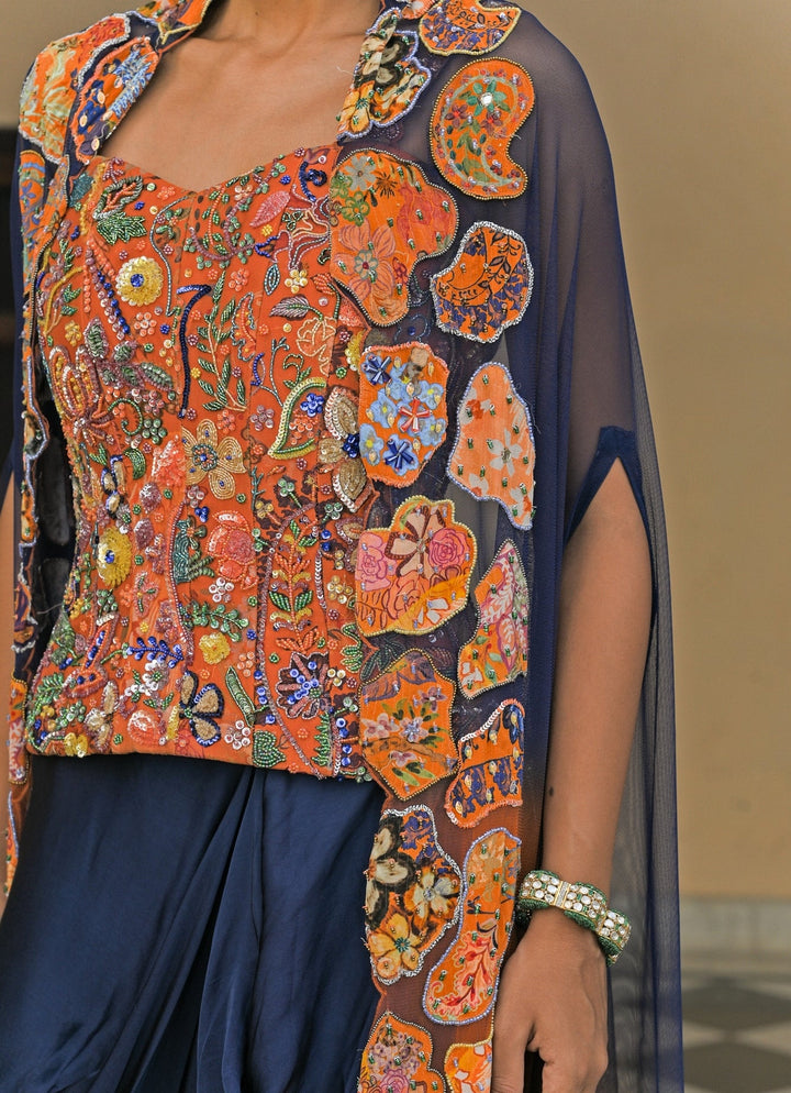 Juhi Bengani Orange And Blue Cowl Skirt Set With Corset And CapeFabilicious Fashion