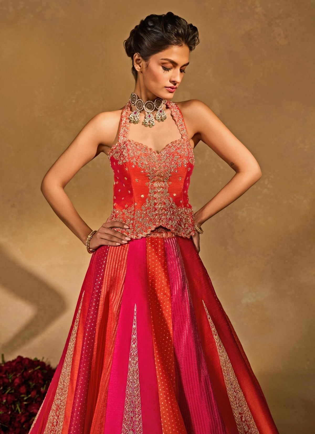 Orange and pink corset lehenga with sweetheart neckline by Chamee and Palak