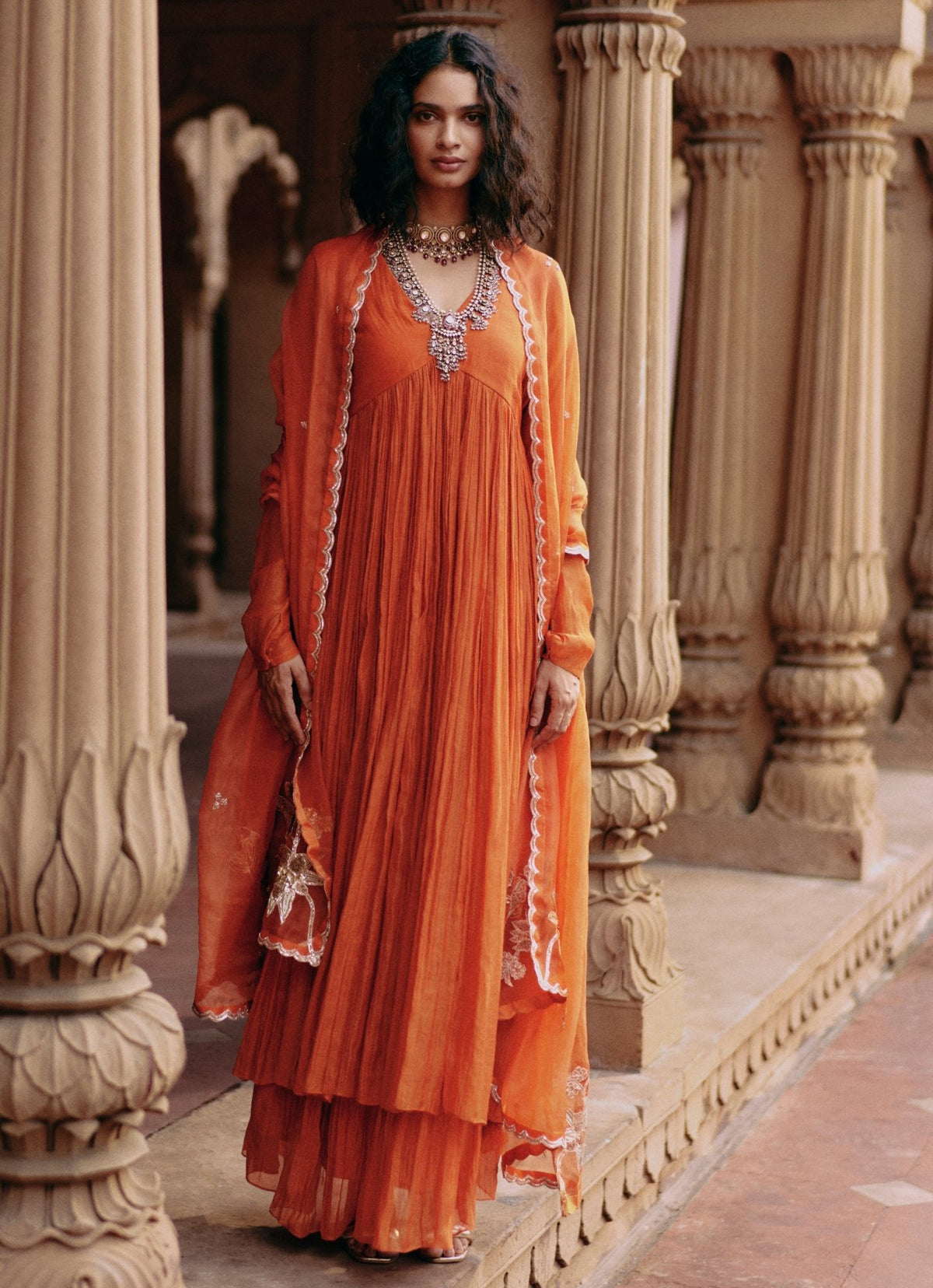 Paulmi and Harsh Orange Embroidered Chanderi Anarkali with Skirt for a henna night in Saudi Arabia