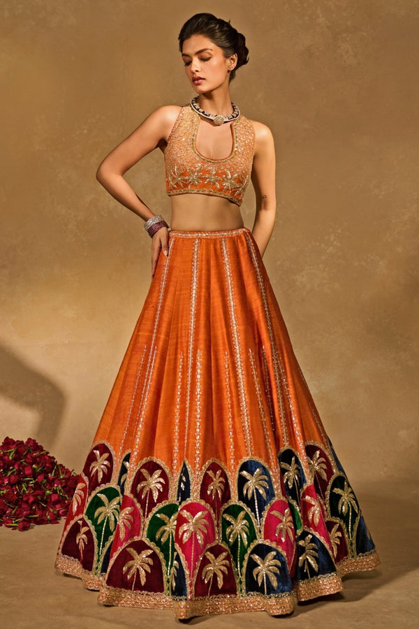 Orange multicolour raw silk lehenga by Chamee and Palak, a bridal reception lehenga