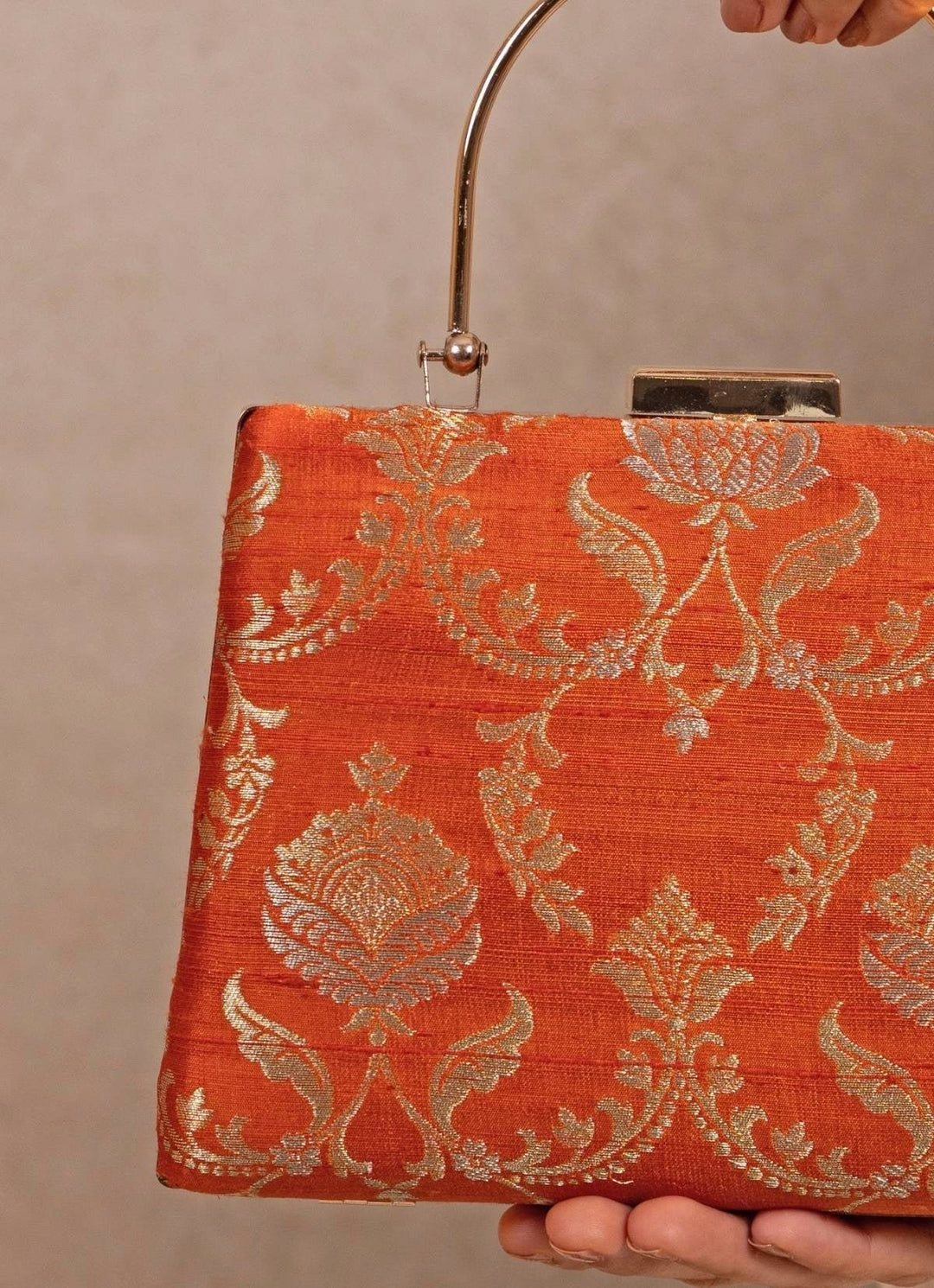 Amyra Orange Raw Silk Top Handle ClutchFabilicious Fashion