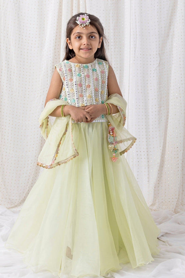 Girls' pastel green organza lehenga set by Chotibuti for coordinated family outfits at an Indian wedding