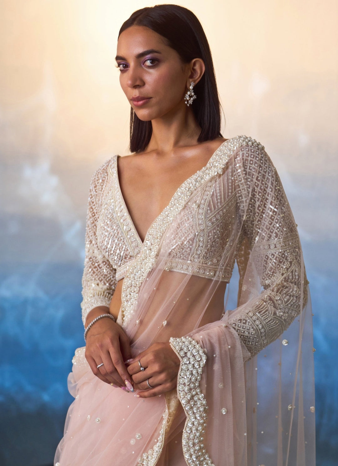 Pastel Peach Net Saree with Full Sleeve Embroidered Blouse Angad Singh - Fabilicious Fashion