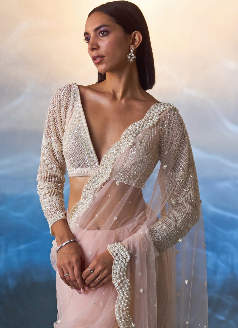 Pastel Peach Net Saree with Full Sleeve Embroidered Blouse Angad Singh - Fabilicious Fashion