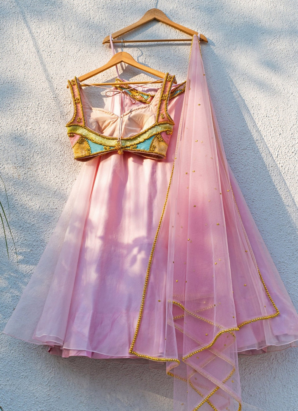 Pastel Pink Organza Lehenga With Multicolour Blouse Anisha Shetty - Fabilicious Fashion