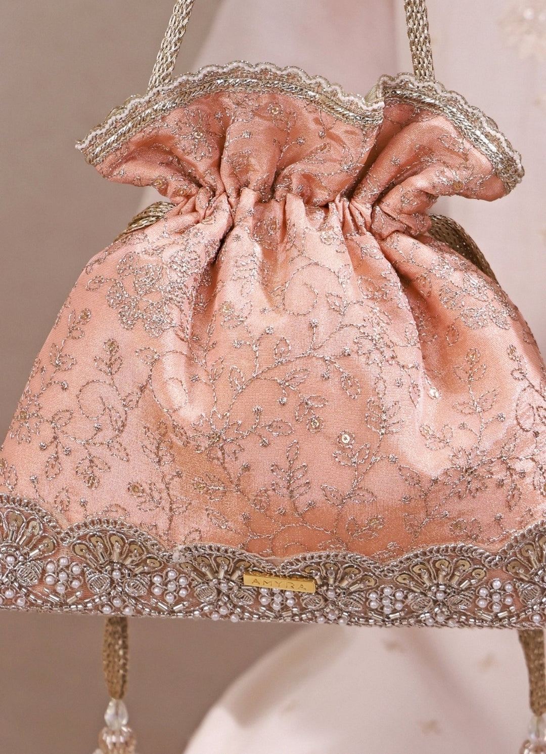 Amyra Peach Embroidered Tissue Silk PotliFabilicious Fashion