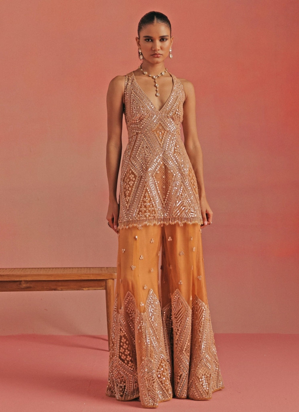 Twenty Nine Peach Soft Net Mirrorwork Peplum Kurta Sharara SetFabilicious Fashion