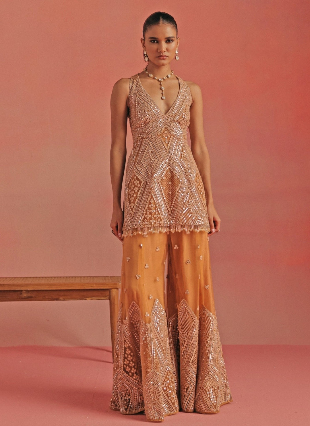 Twenty Nine Peach Soft Net Mirrorwork Peplum Kurta Sharara SetFabilicious Fashion