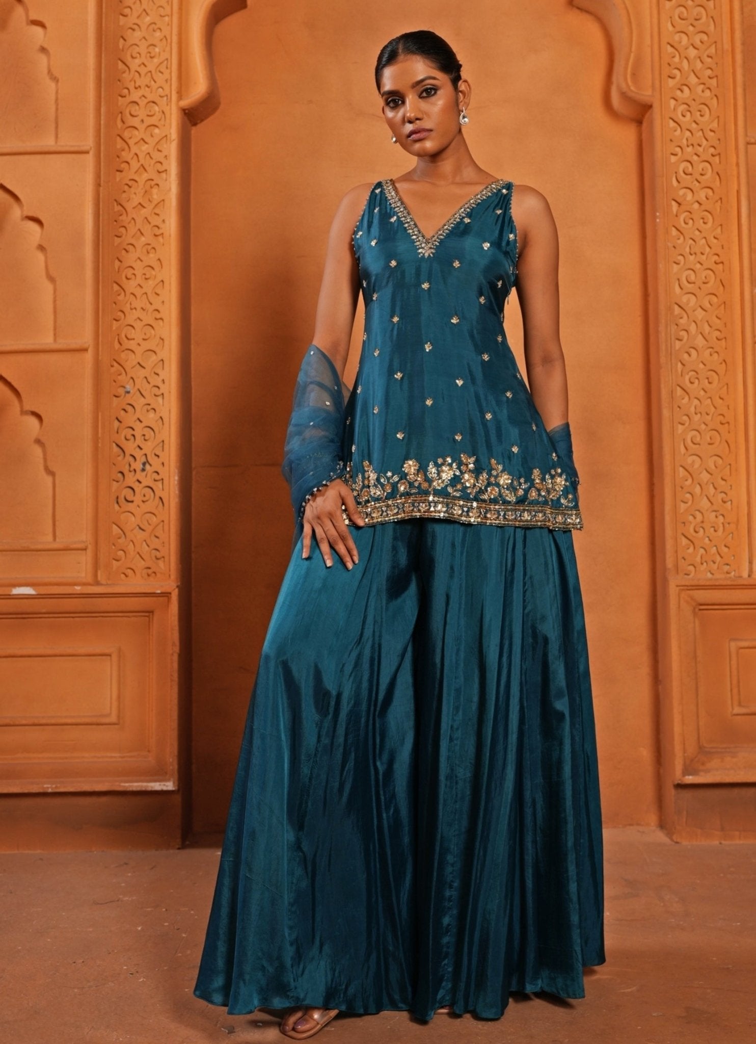 Peacock blue embroidered silk sharara set for Indian wedding guest