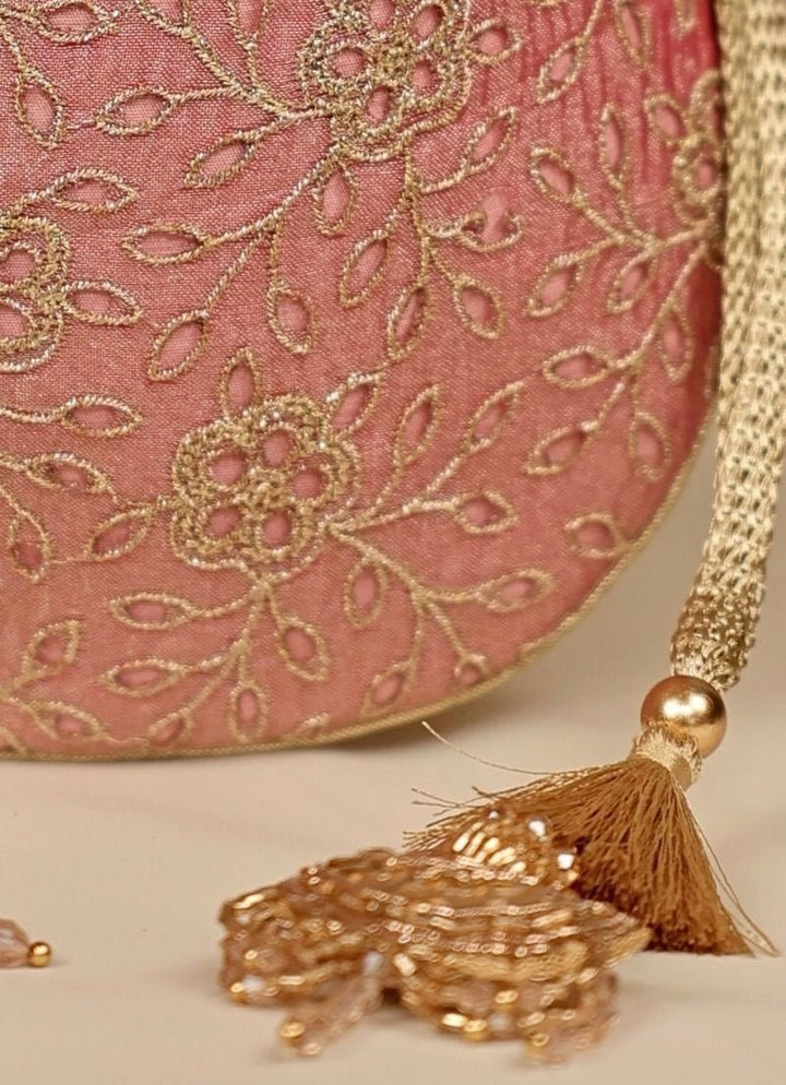 Amyra Pink Embroidered Tissue PotliFabilicious Fashion