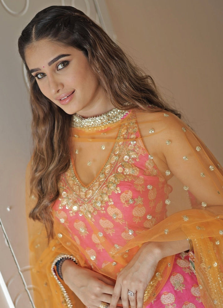 Gopi Vaid Pink Printed Cotton Silk Halter Kurta Sharara Set With Orange DupattaFabilicious Fashion