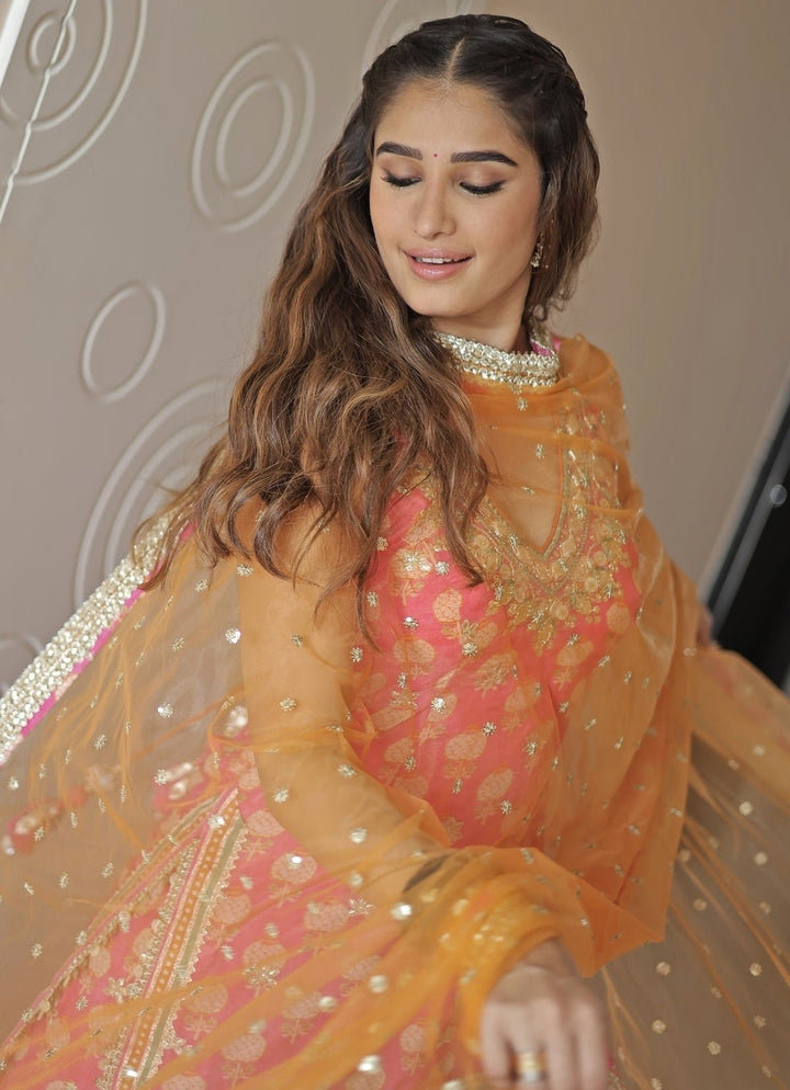 Gopi Vaid Pink Printed Cotton Silk Halter Kurta Sharara Set With Orange DupattaFabilicious Fashion