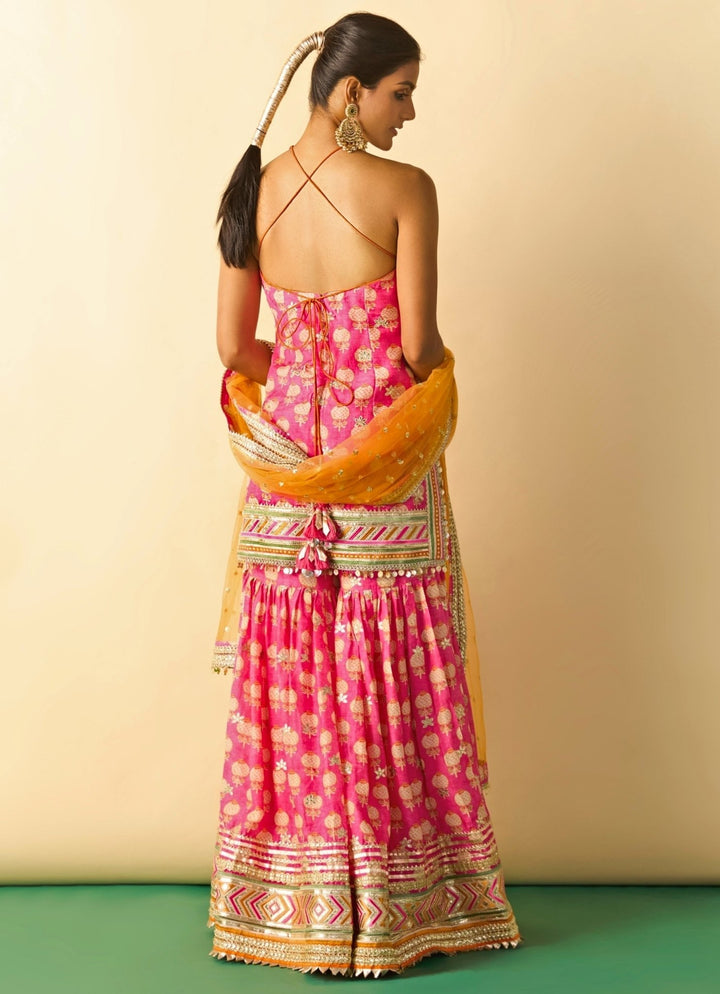 Gopi Vaid Pink Printed Cotton Silk Halter Kurta Sharara Set With Orange DupattaFabilicious Fashion