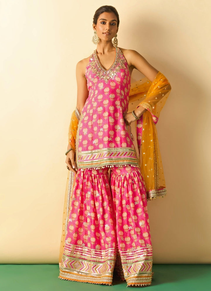 Gopi Vaid Pink Printed Cotton Silk Halter Kurta Sharara Set With Orange DupattaFabilicious Fashion