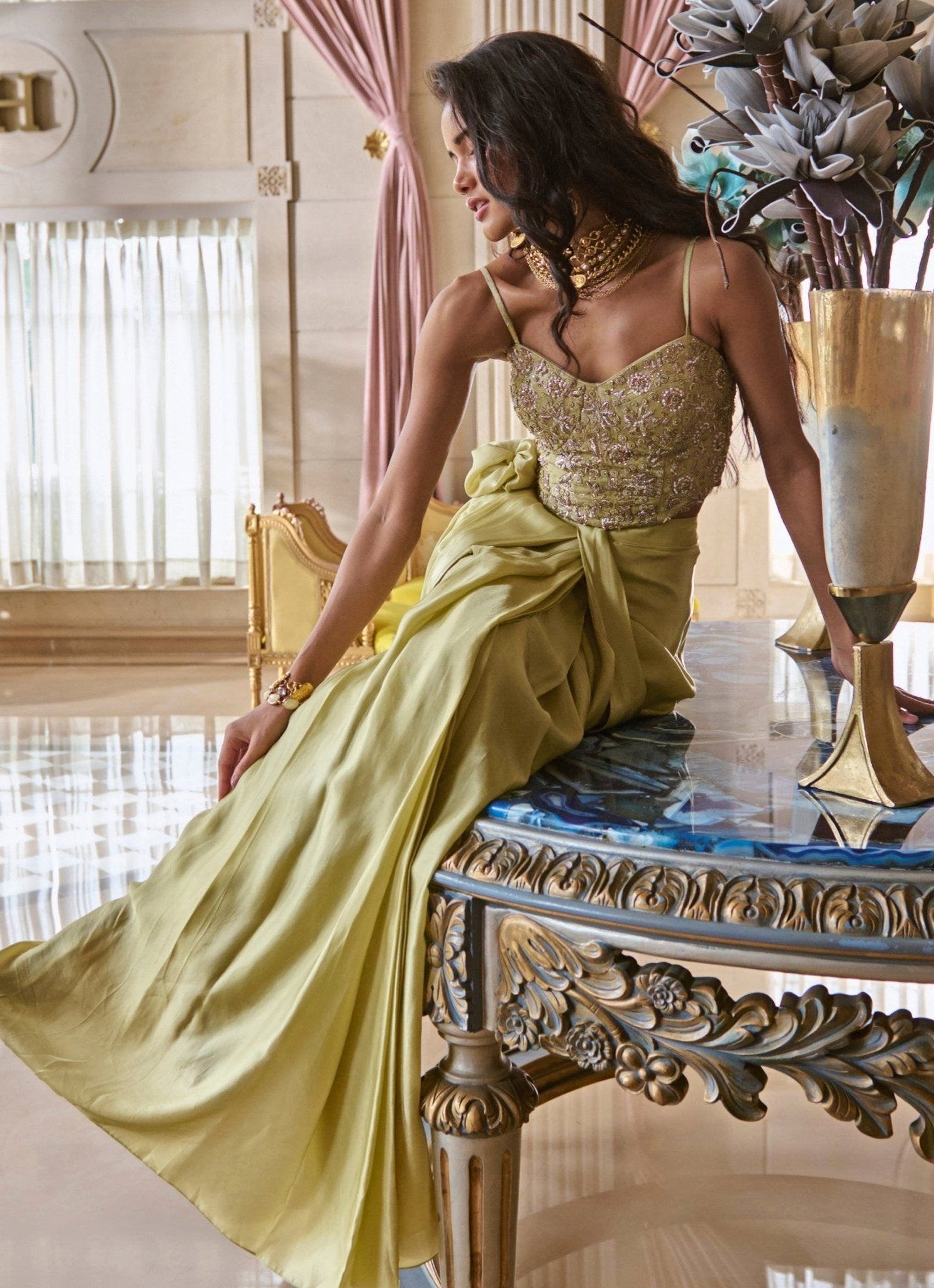 Pista green satin saree with corset by Paulmi and Harsh — corset saree for wedding guests in 2026