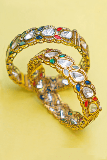 Polki and Multi Coloured Stones Gold Bangle Zevar by Geeta - Fabilicious Fashion