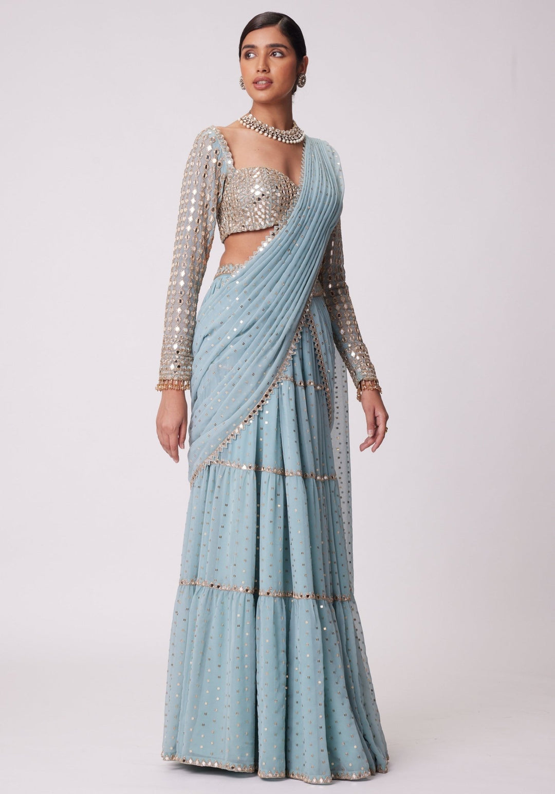 Powder Blue Tiered Saree With Embroidered Full Sleeves Blouse Vvani by Vani Vats - Fabilicious Fashion