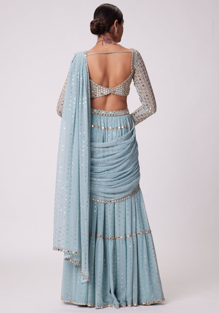 Powder Blue Tiered Saree With Embroidered Full Sleeves Blouse Vvani by Vani Vats - Fabilicious Fashion