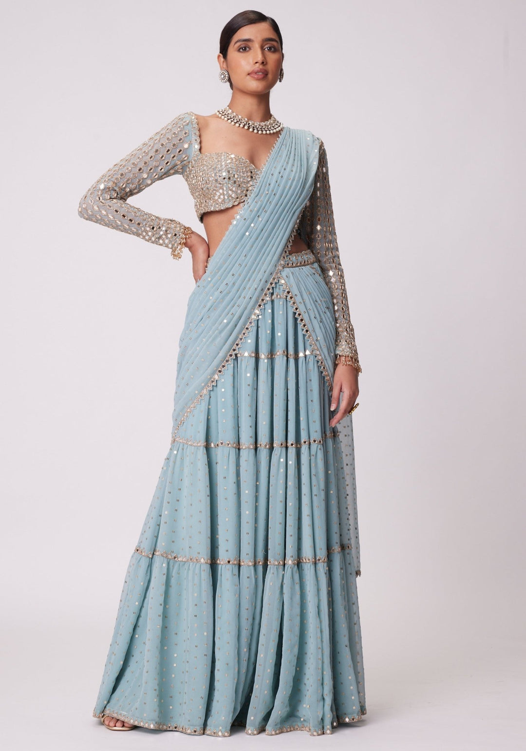 Powder Blue Tiered Saree With Embroidered Full Sleeves Blouse Vvani by Vani Vats - Fabilicious Fashion