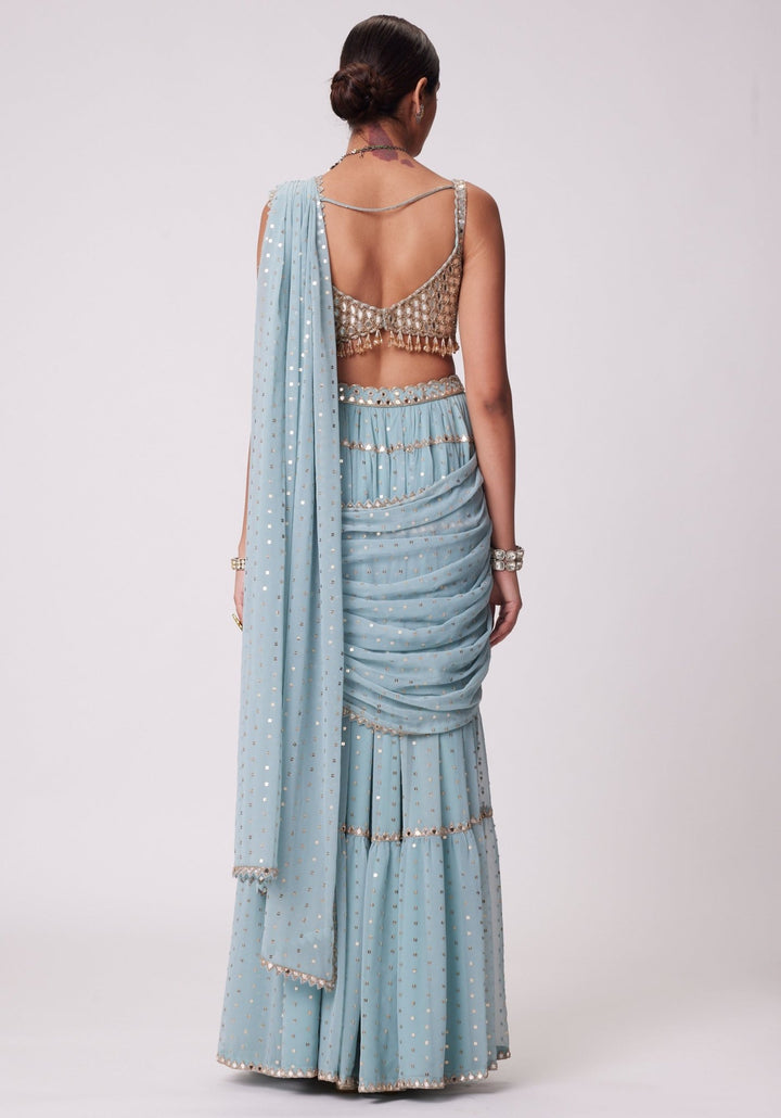 Powder Blue Tiered Saree With Sleeveless Blouse Vvani by Vani Vats - Fabilicious Fashion