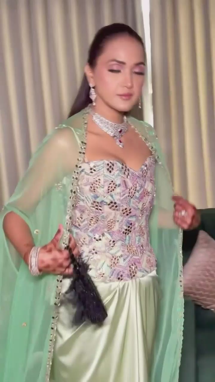 Green Satin Dhoti Skirt With Mirror Work Corset And Cape