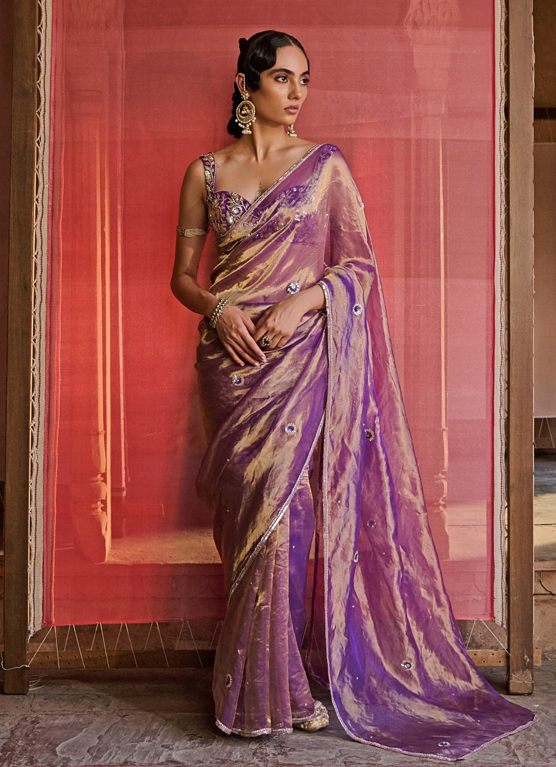 Purple embroidered silk tissue saree for meeting his family for the first time