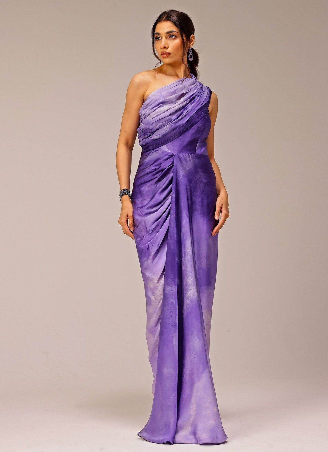 Studio Surbhi Purple Georgette Satin Printed One-Shoulder Drape GownFabilicious Fashion