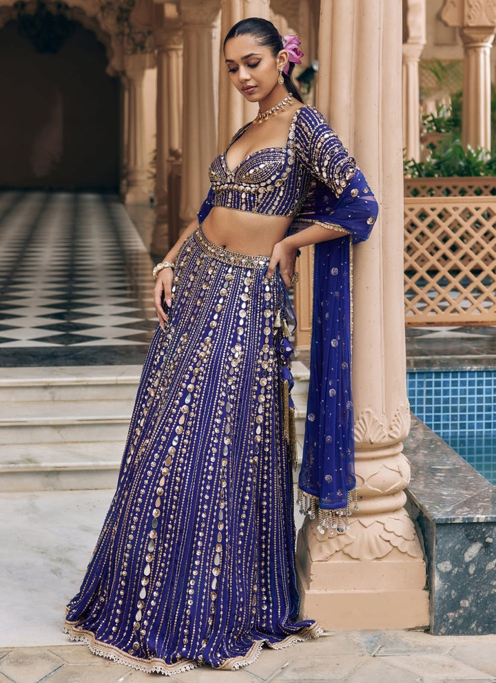 Nidhika Shekhar Purplish Blue Embroidered Crepe Bridal Lehenga SetFabilicious Fashion