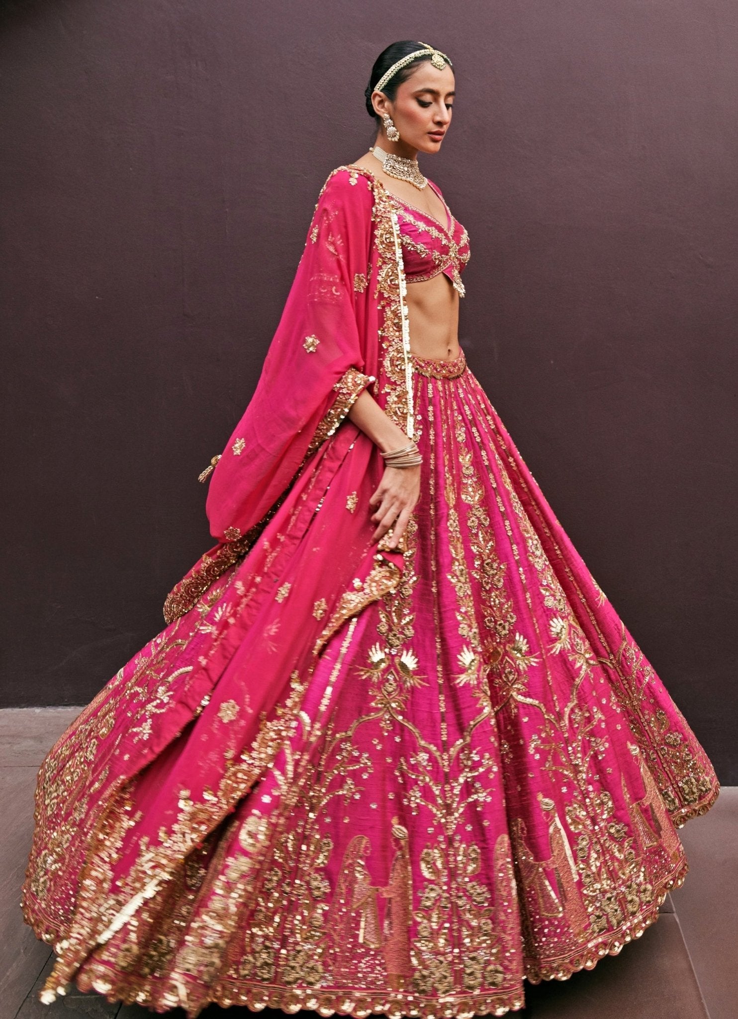 Rani pink silk bridal lehenga for bold bride