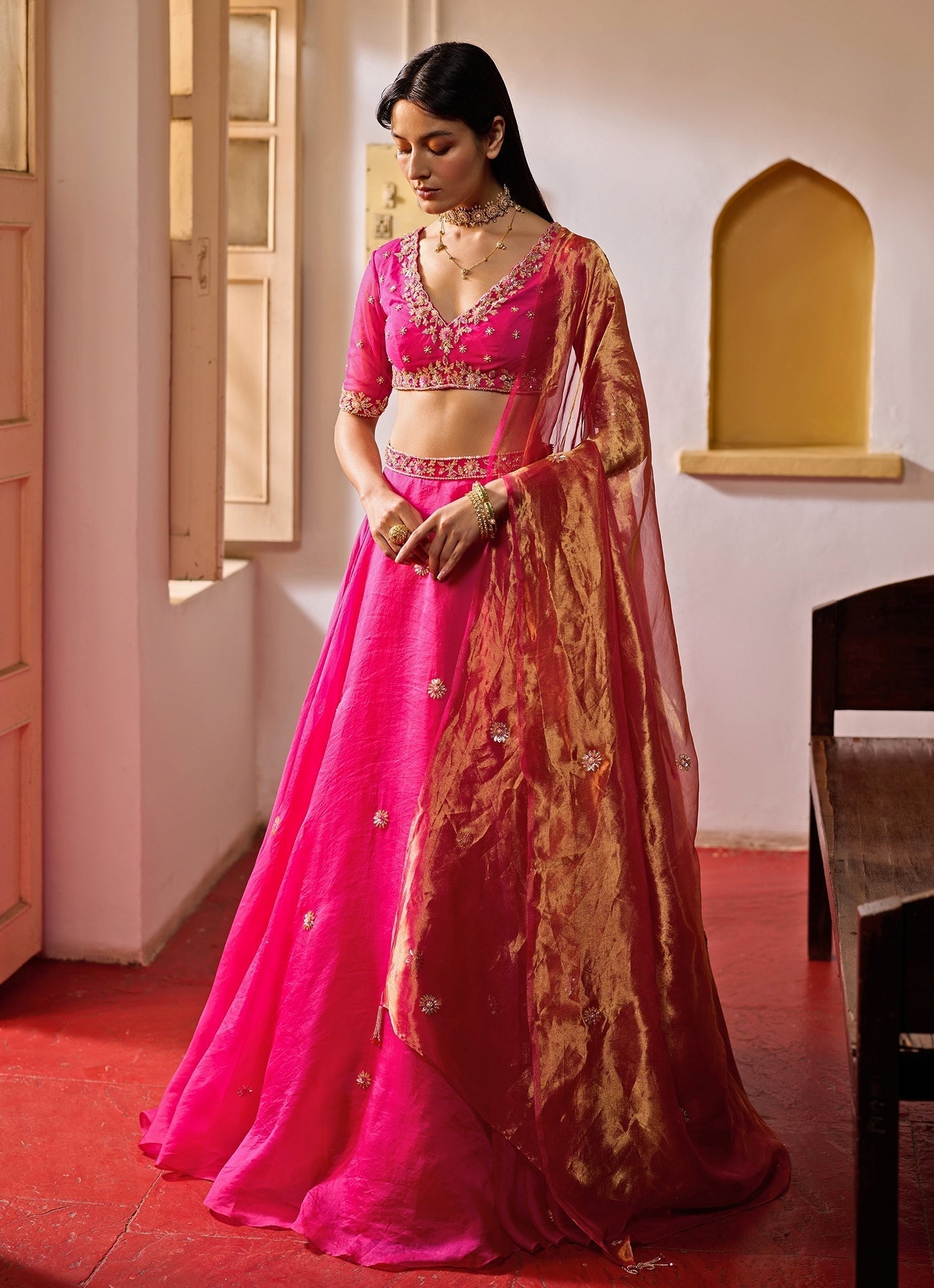 Rani pink embroidered organza lehenga set for engagement