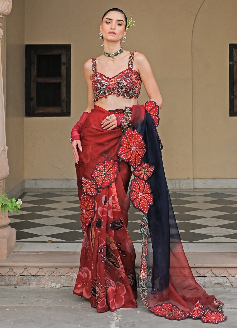 Red and black organza saree with corset by Juhi Bengani for sangeet evening