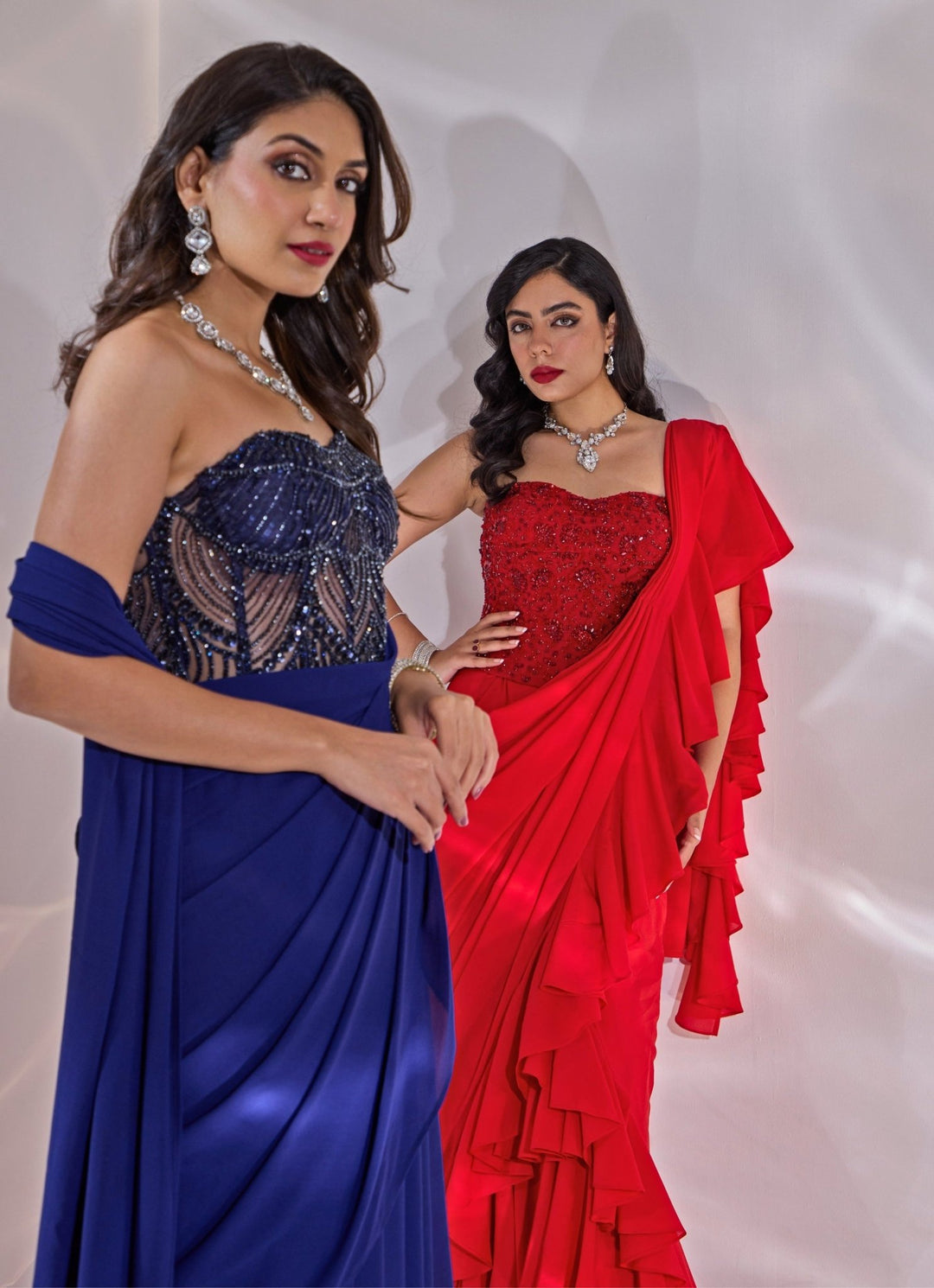 Red Georgette Ruffle Saree With Corset Blouse Rashika Sharma - Fabilicious Fashion