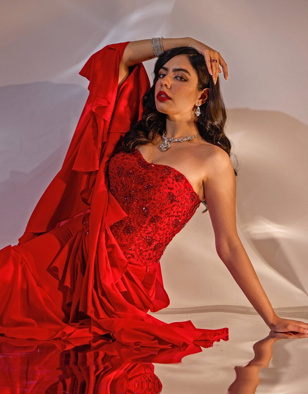 Red Georgette Ruffle Saree With Corset Blouse Rashika Sharma - Fabilicious Fashion