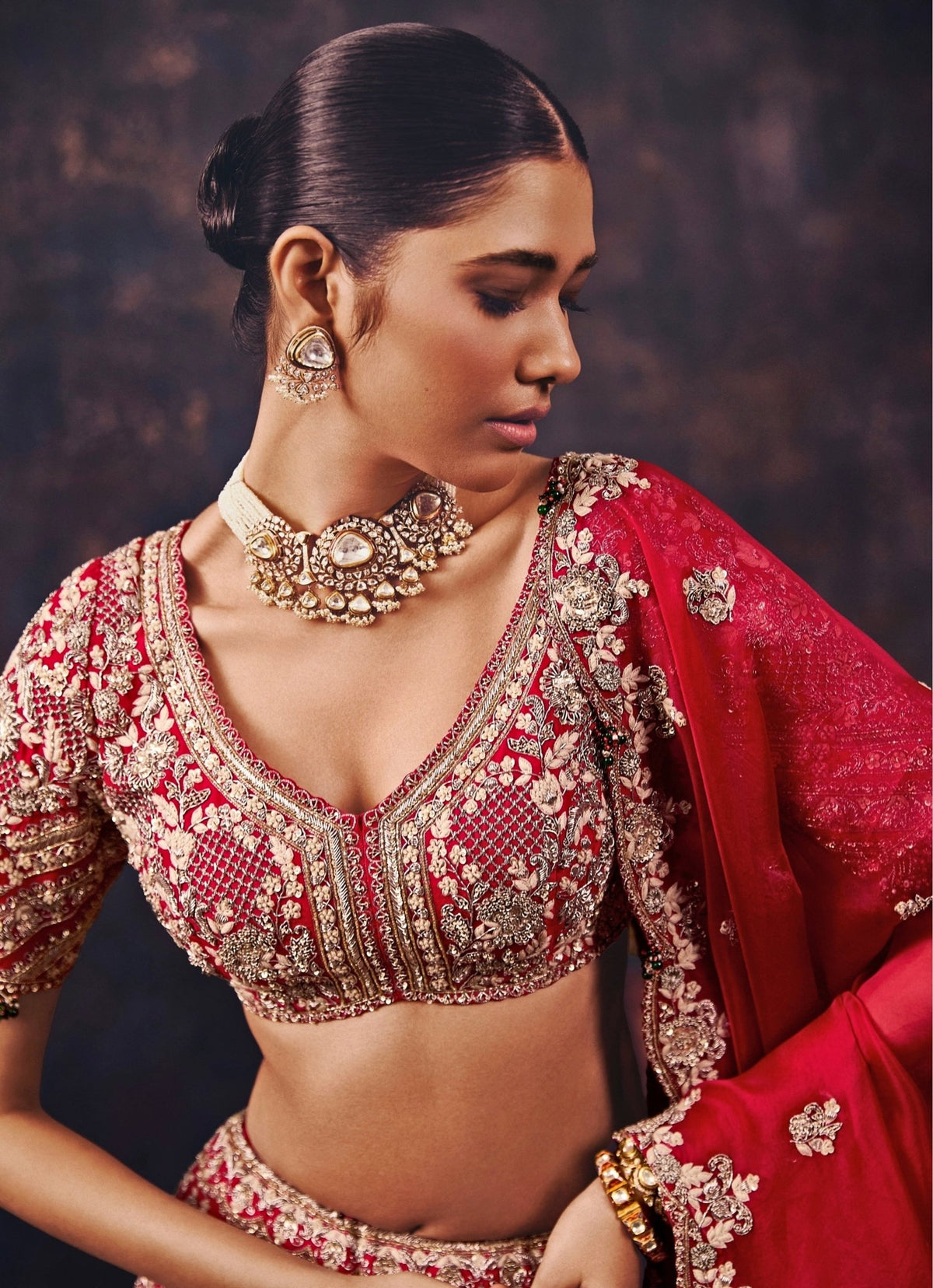 Red mirror silk lehenga with V neckline blouse by Prisho