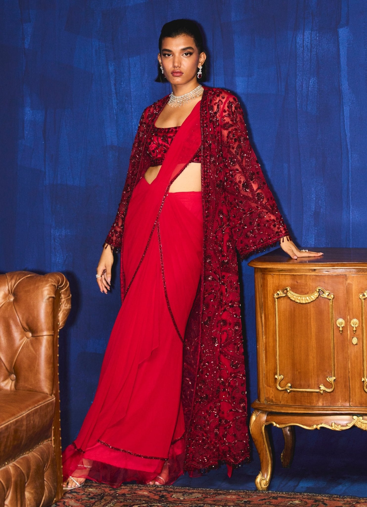 Red satin saree with jacket for newlywed Valentine dinner