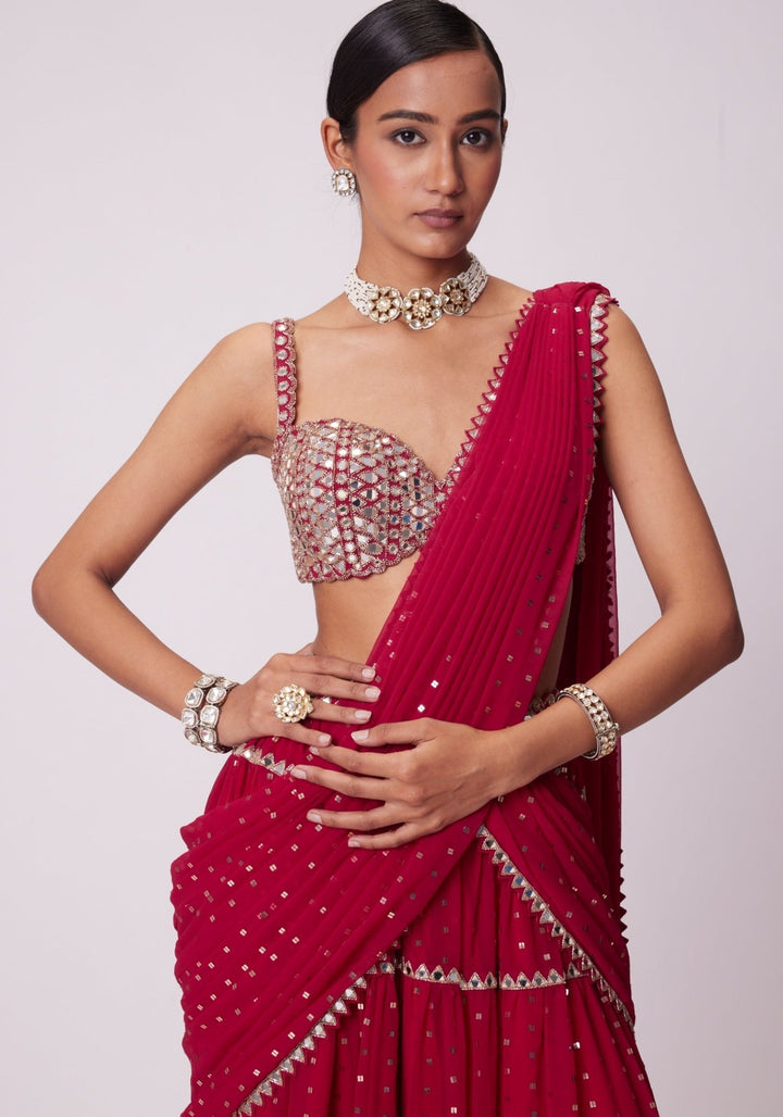 Red Tiered Saree With Sleeveless Blouse Vvani by Vani Vats - Fabilicious Fashion