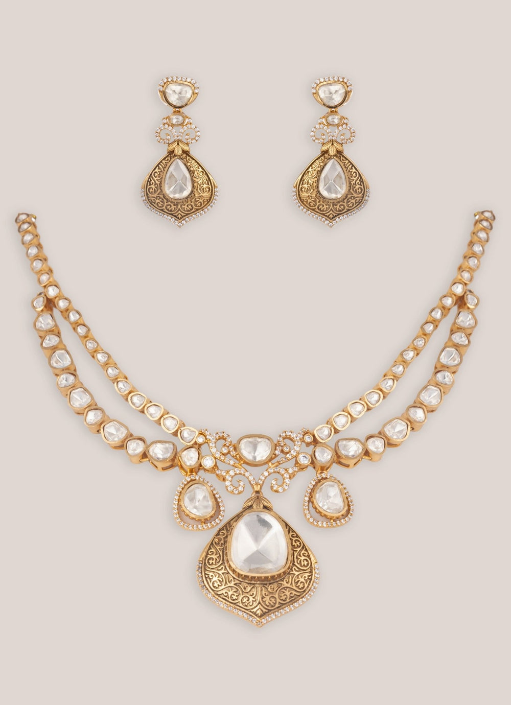 Zevar by Geeta Regal Gold Finish Moissanite Stone Necklace SetFabilicious Fashion