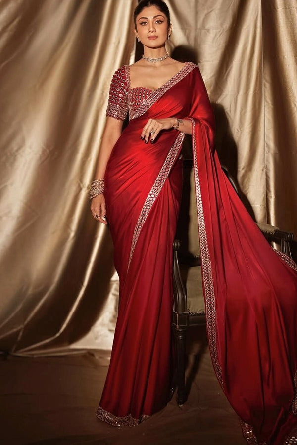 Red satin saree with embroidered mirror blouse by Vvani by Vani Vats
