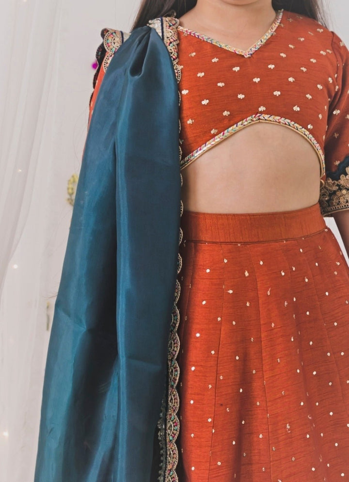 Chotibuti Rust Orange And Teal Blue Silk Lehenga SetFabilicious Fashion
