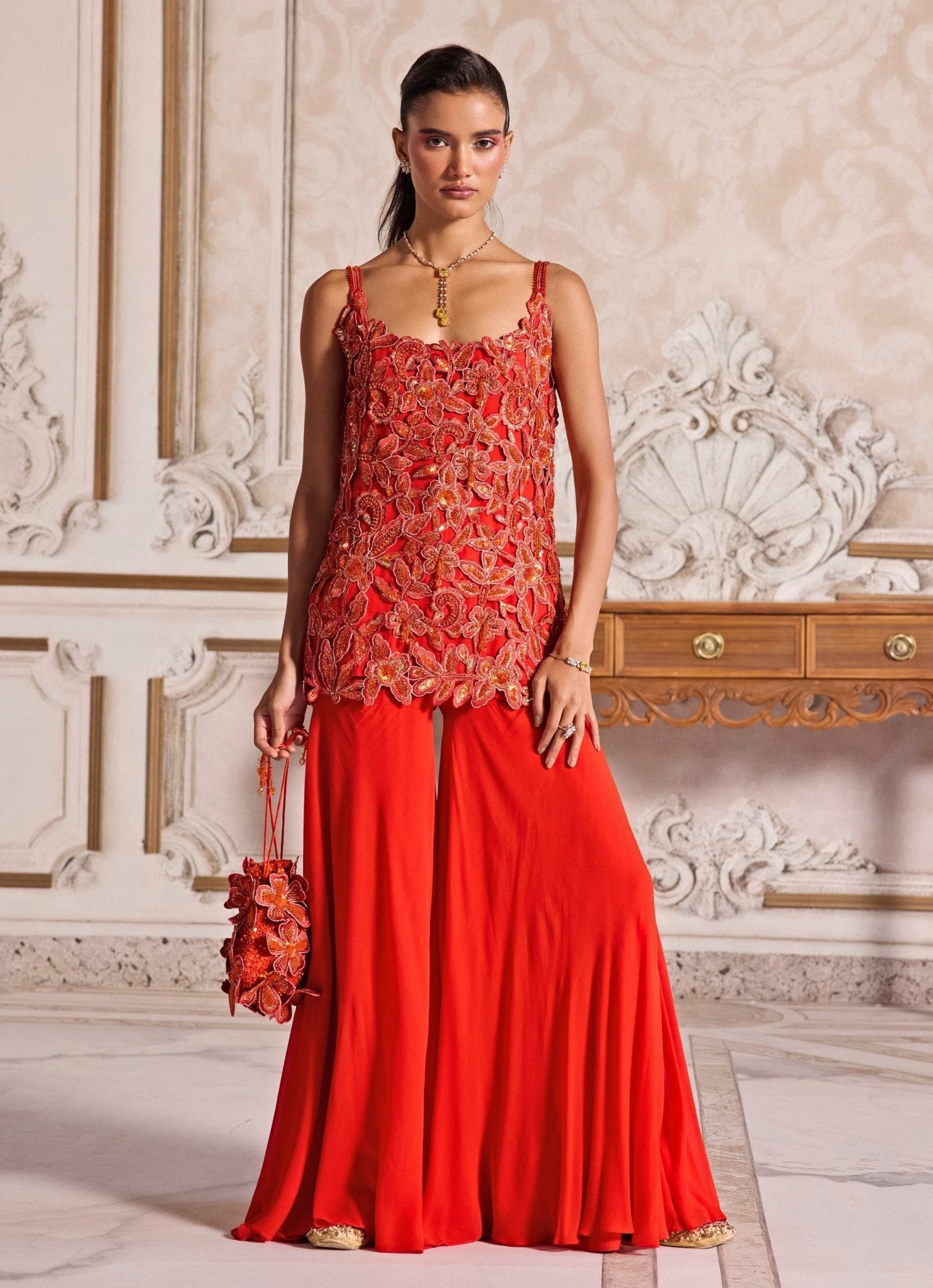 Rust orange embroidered georgette kurta sharara set by Sanya Gulati