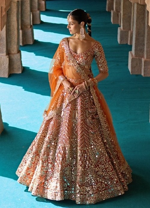 Angad Singh Rust Orange Organza Lehenga SetFabilicious Fashion