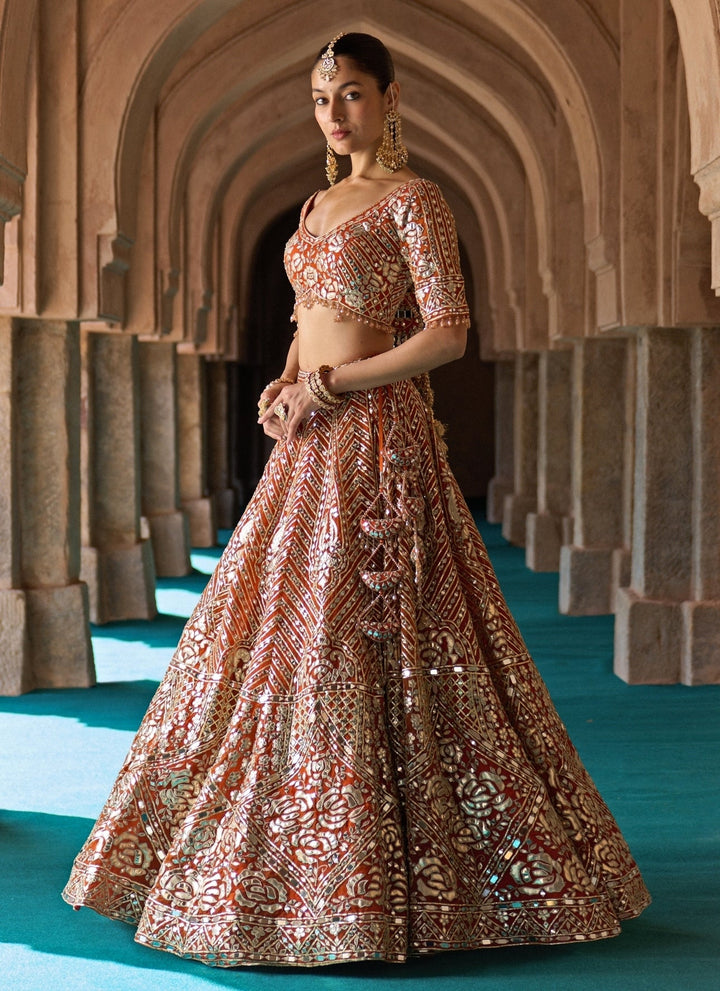 Angad Singh Rust Orange Organza Lehenga SetFabilicious Fashion
