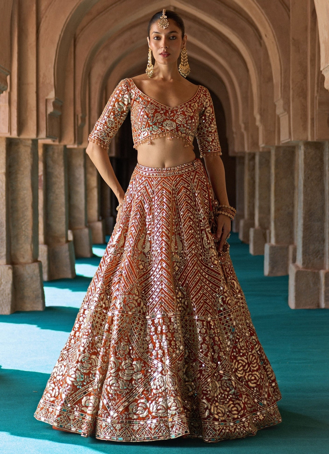Angad Singh Rust Orange Organza Lehenga SetFabilicious Fashion