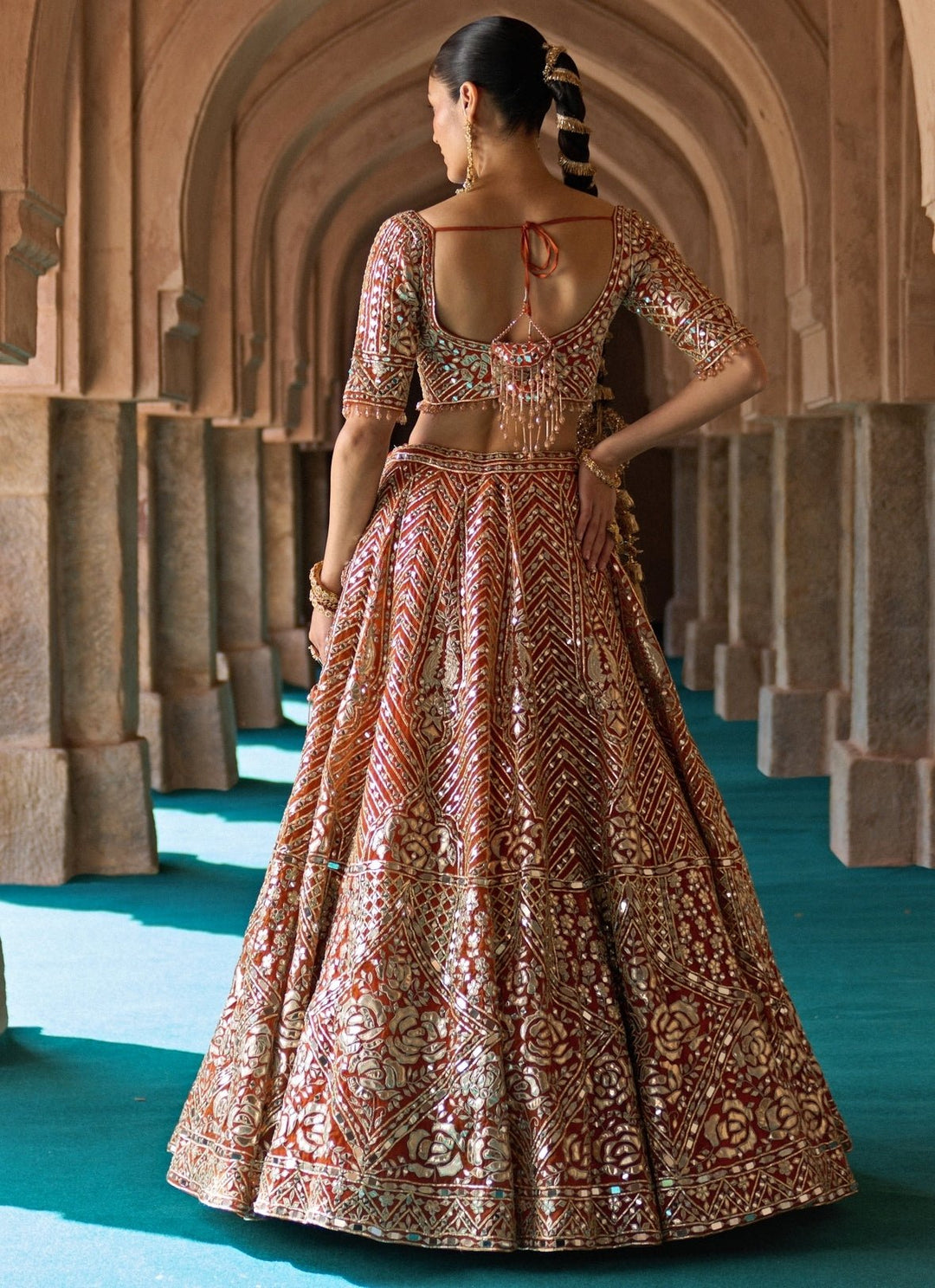 Angad Singh Rust Orange Organza Lehenga SetFabilicious Fashion