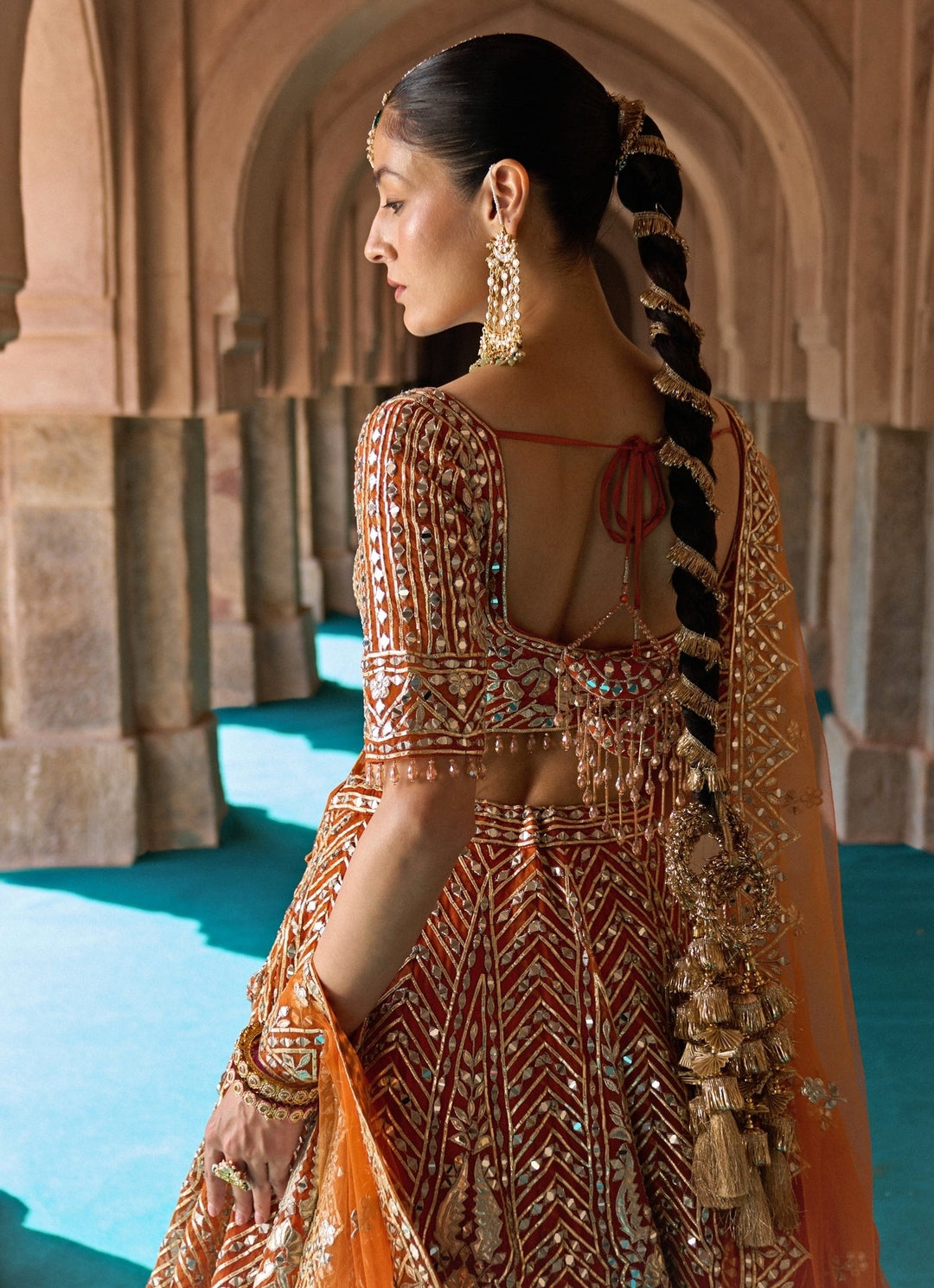 Angad Singh Rust Orange Organza Lehenga SetFabilicious Fashion