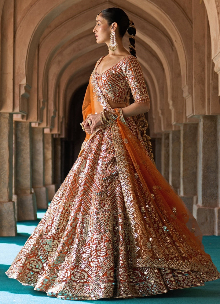 Angad Singh Rust Orange Organza Lehenga SetFabilicious Fashion