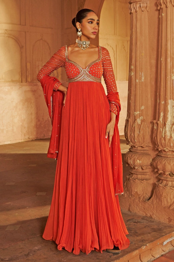 Rust sequin embroidered anarkali for festive season wedding guests by Nidhika Shekhar